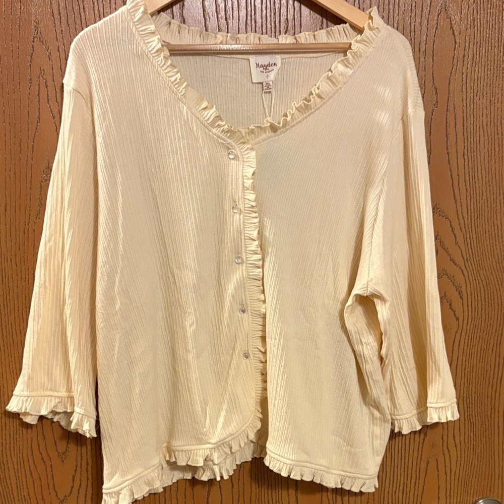 Ruffled cream top